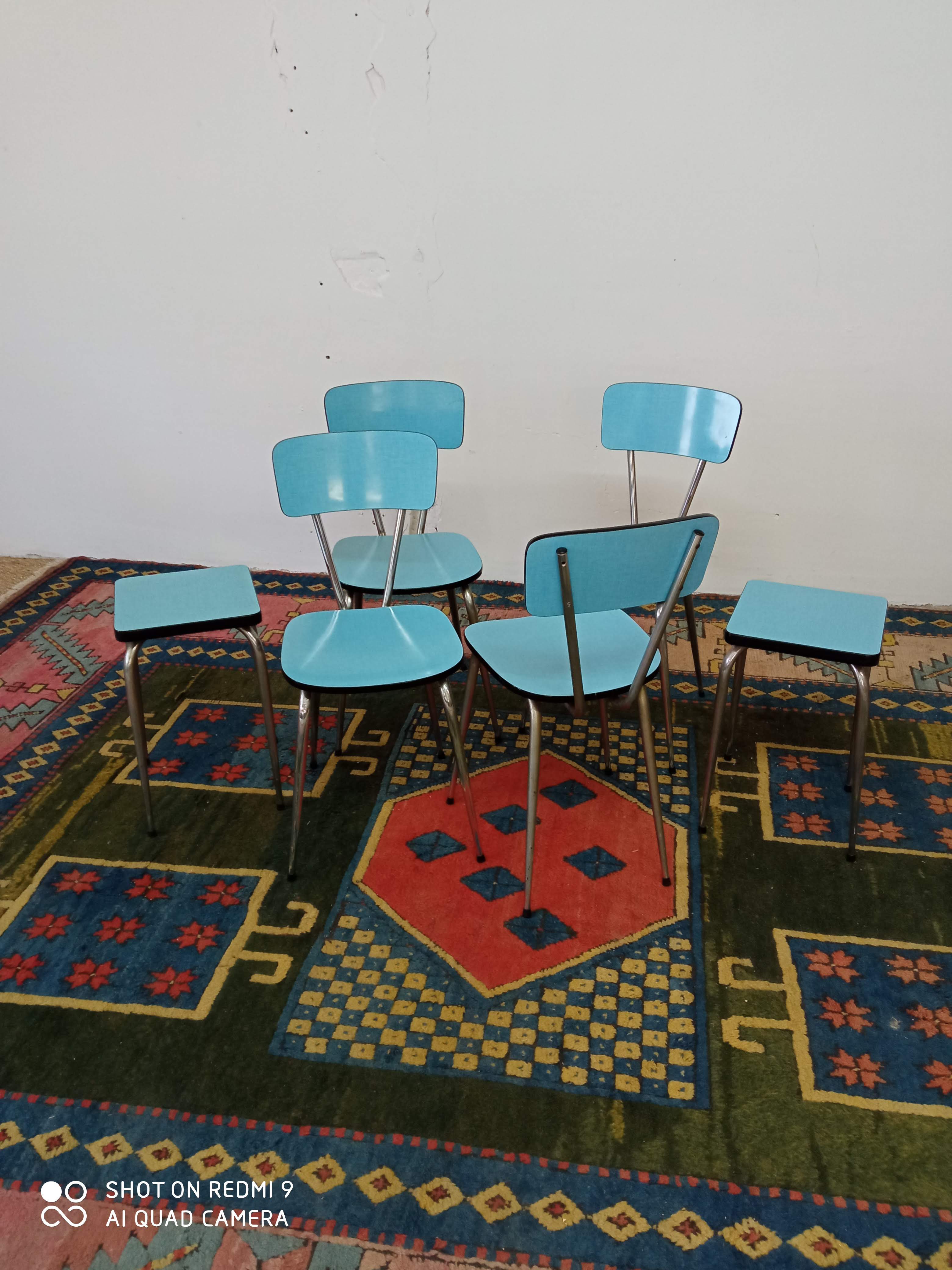 Blue formica chairs and stools