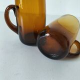 Pair of vintage amber glass tankards
