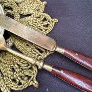 Wood and brass serving utensils
