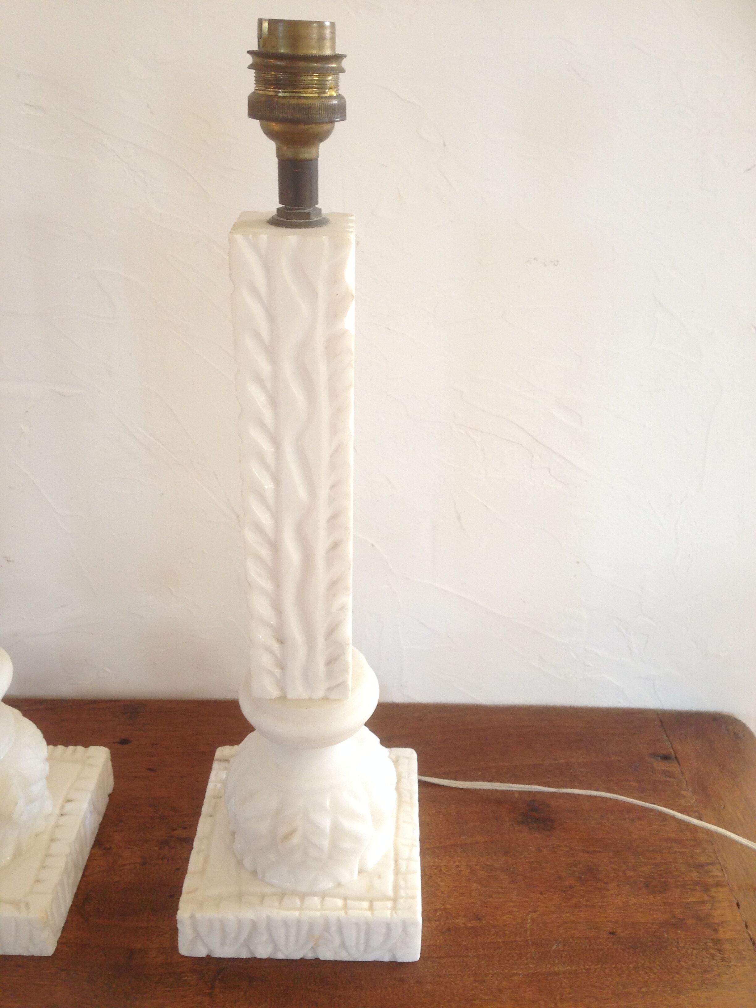 Feet of carved Alabaster column lamp