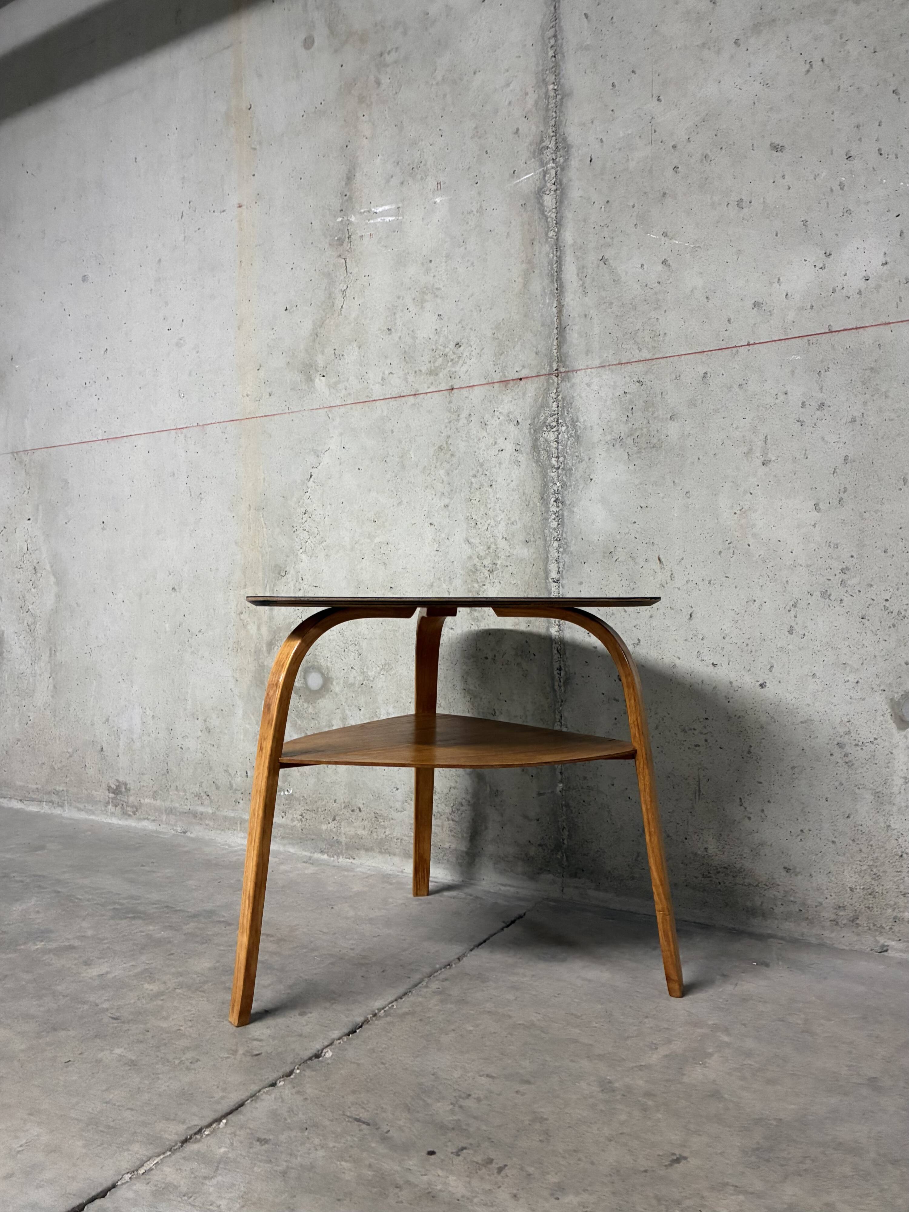 Vintage 1960s tripod coffee table with bow wood mediator by Steiner.
