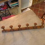 Coat rack with six wooden hooks