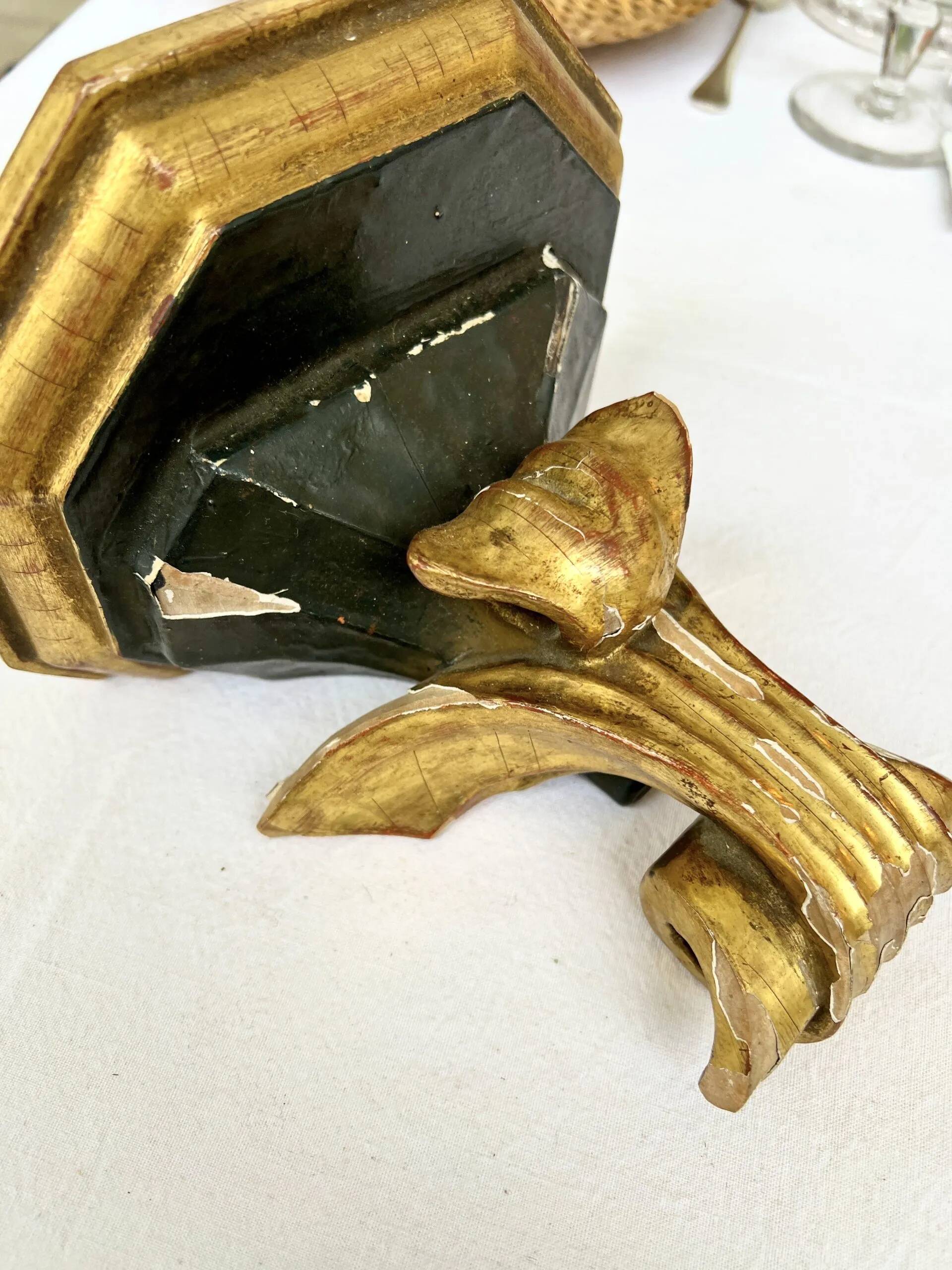 Wall-mounted console in painted gold wood