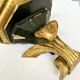 Wall-mounted console in painted gold wood