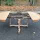 Extendable round farmhouse dining table restored in solid oak from the 19th century