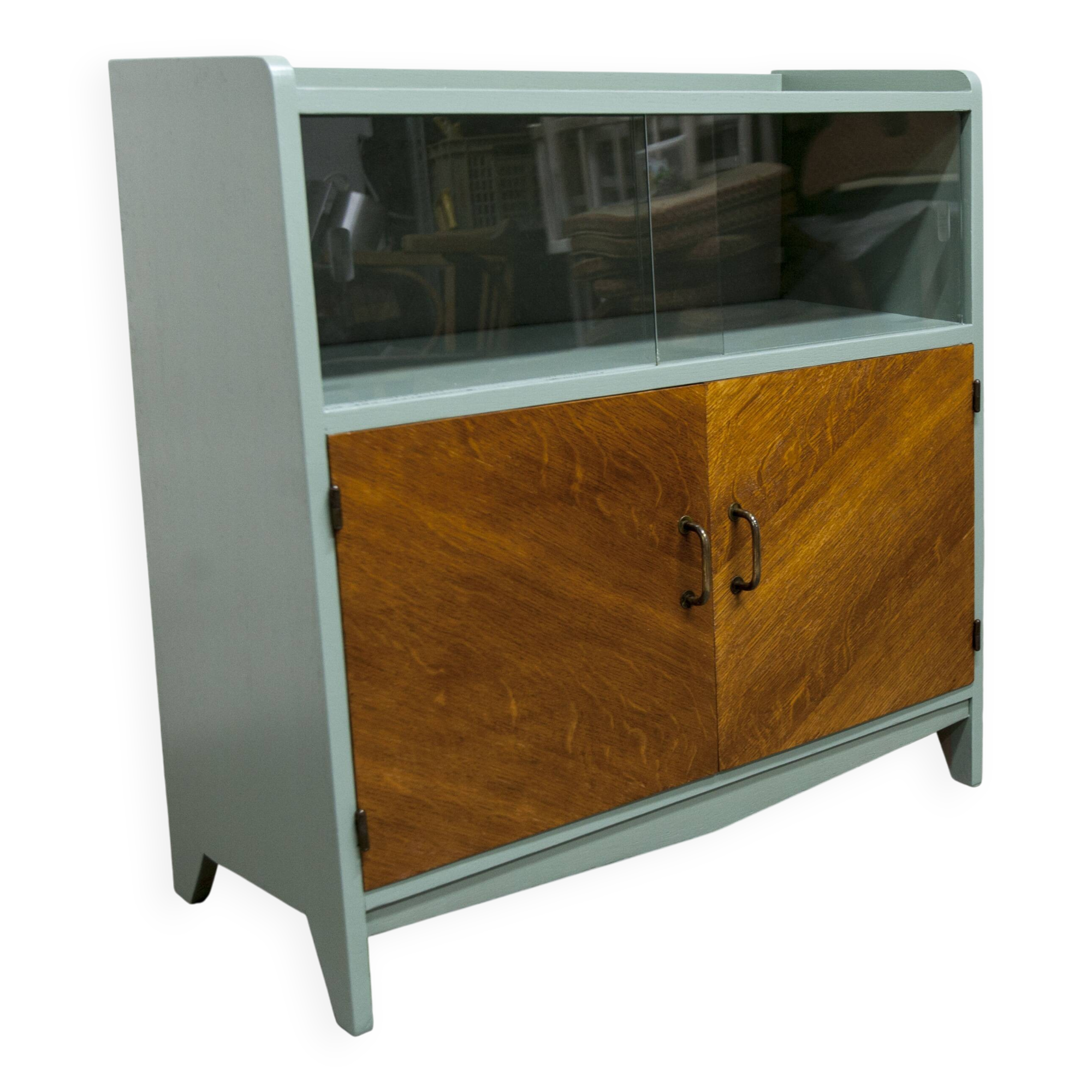 Atypical green noble 1960s low display cabinet.