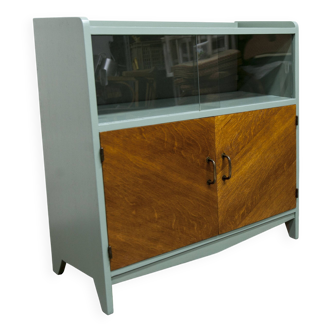 Atypical green noble 1960s low display cabinet.