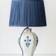 Pair of Royal Delft blue and white ceramic table lamps, 1905, with new pleated silk shades.