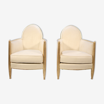 Pair of French Art Deco Armchairs in Parcel Gilt wood