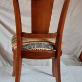 2 varnished solid wood chairs with "ethnic" padding