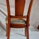 2 varnished solid wood chairs with "ethnic" padding