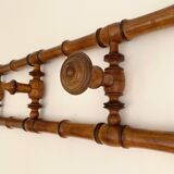 Vintage wooden wall coat rack with 4 swivel hooks from 1920