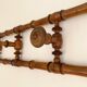 Vintage wooden wall coat rack with 4 swivel hooks from 1920