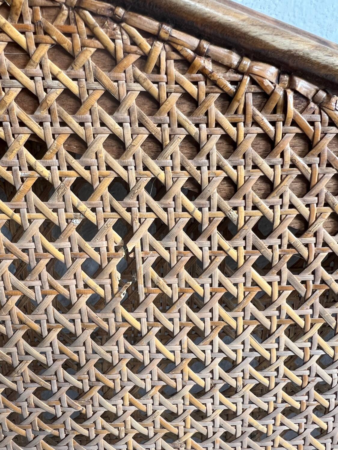 Old wooden and cane bed