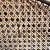 Ancien lit en bois et cannage