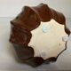 Brown ceramic corolla vase