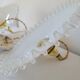 Duo of serrated opaline suspensions