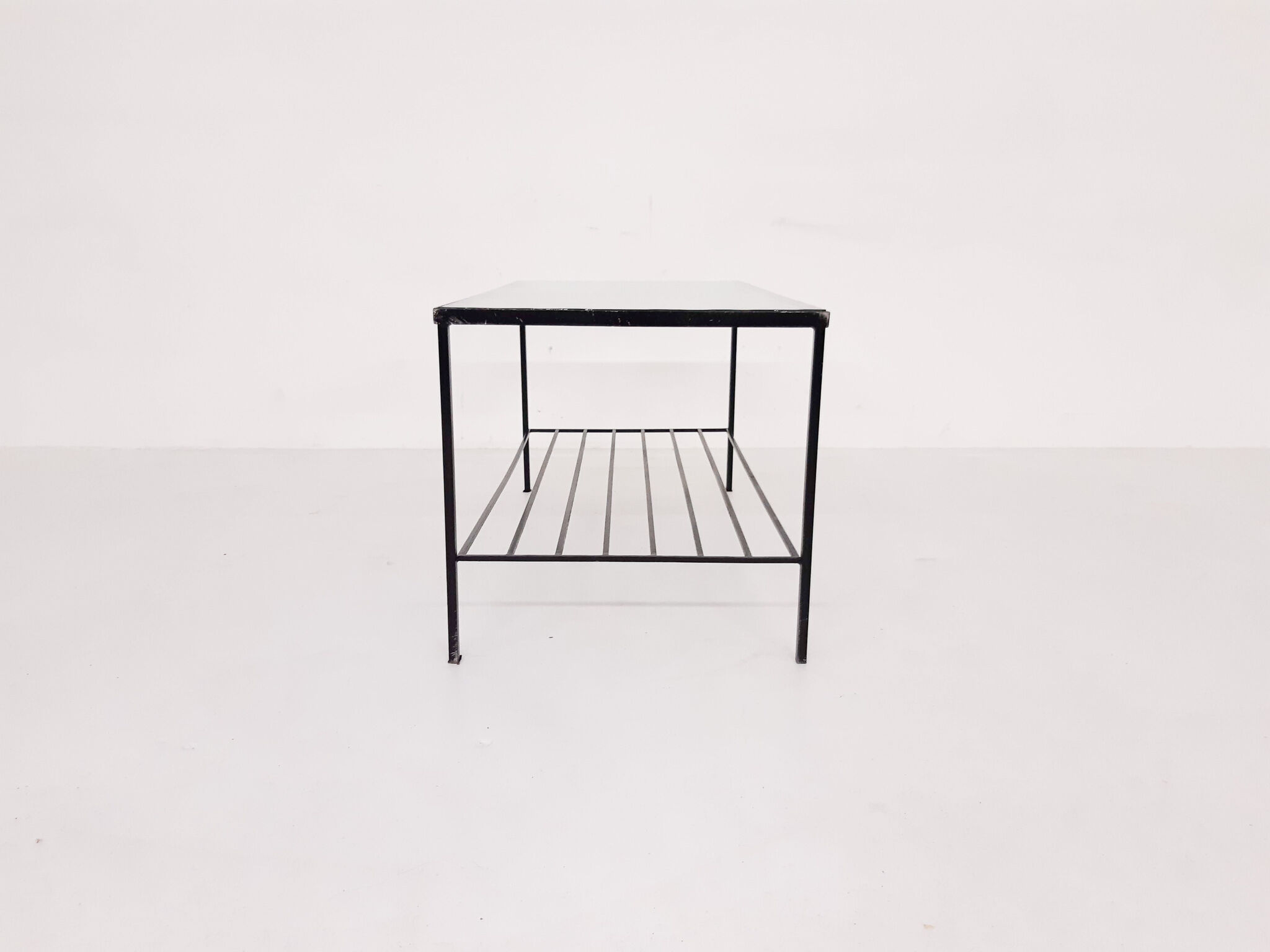 Mid-century modern minimalistic metal and glass coffee table