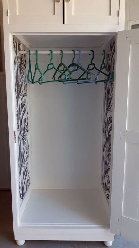 Vintage wardrobe in white wood