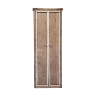 Narrow raw wooden cabinet