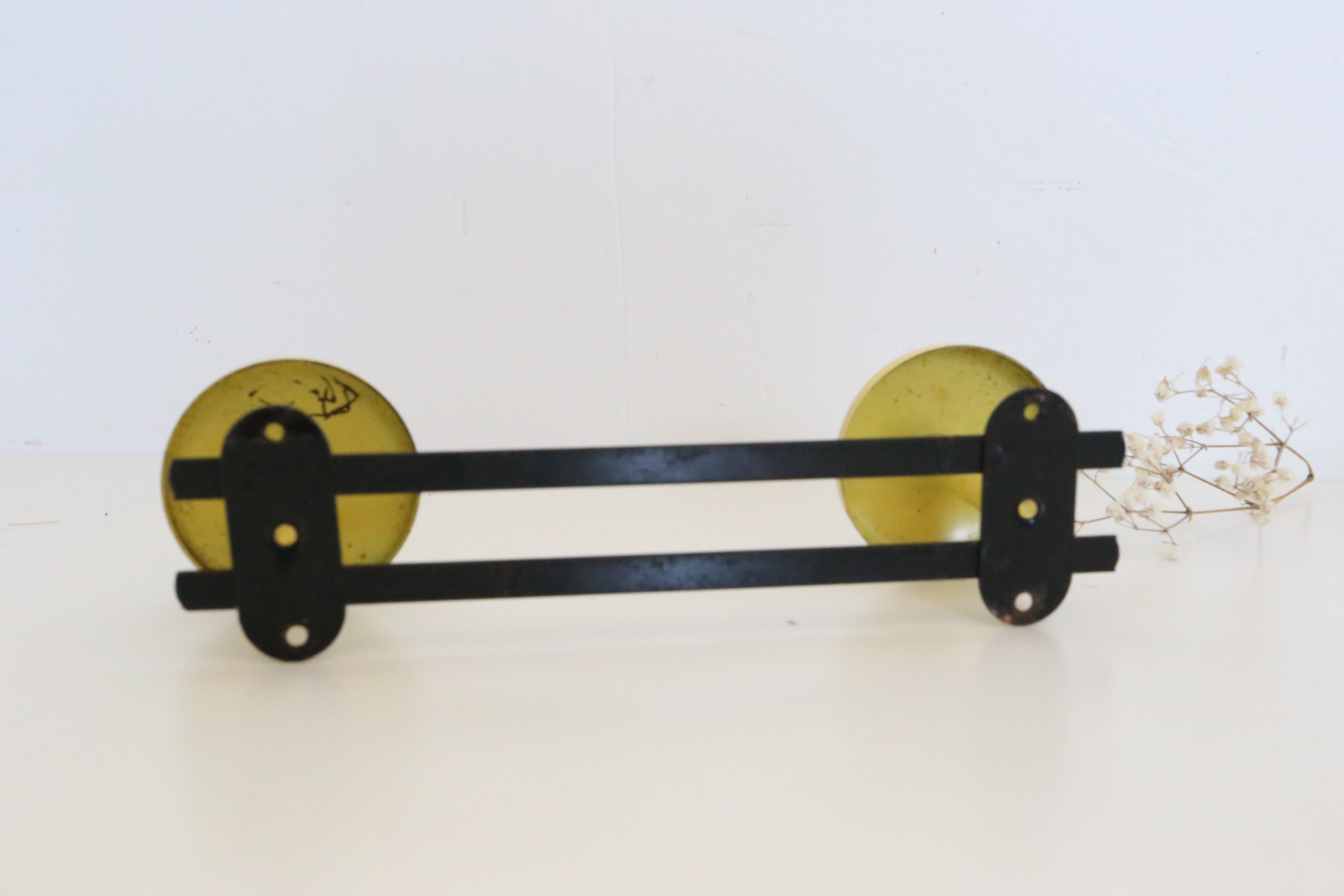 Wall coat rack in yellow and black metal, vintage