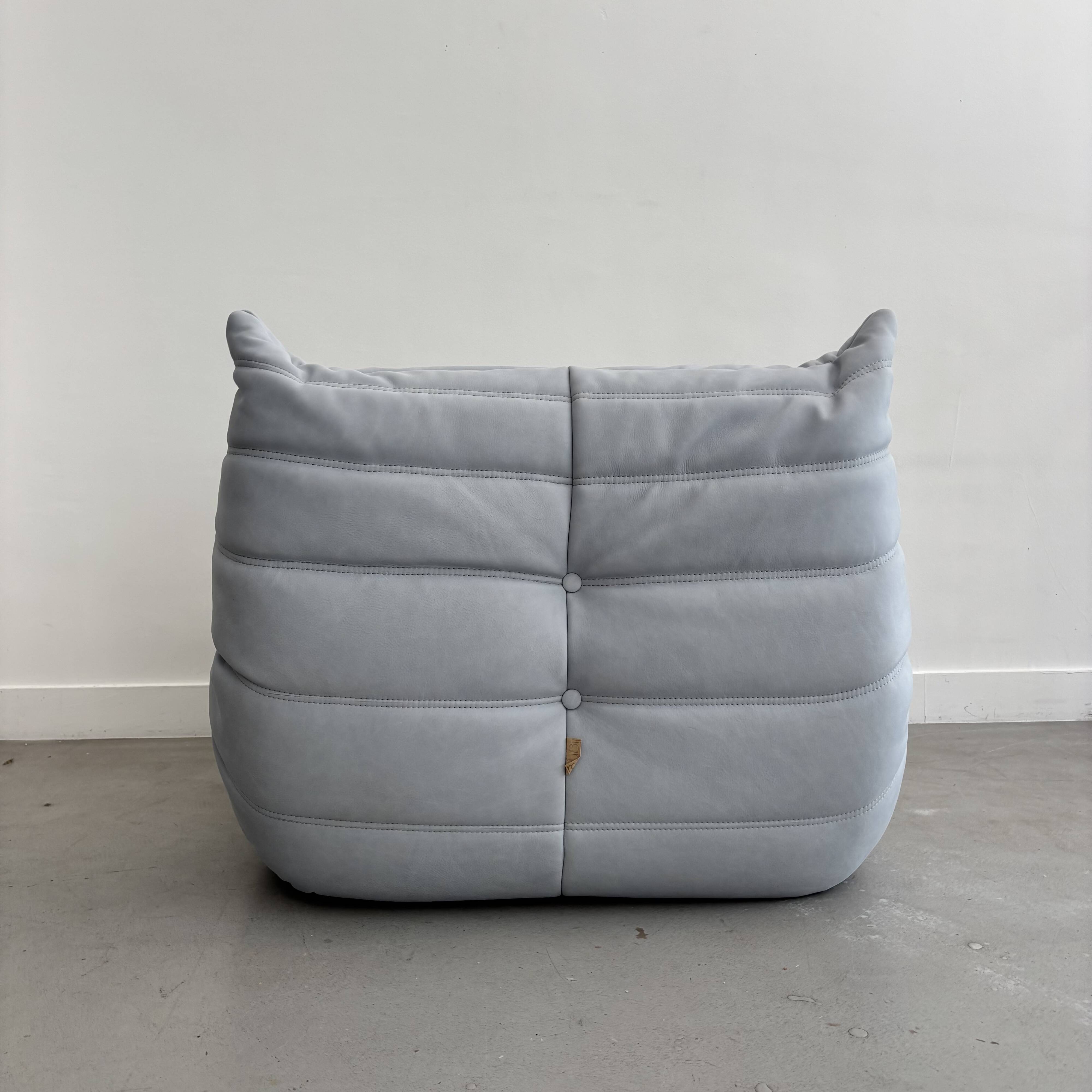 Sky blue leather armchair