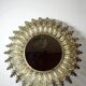 Large Italian sunburst wall mirror in gilded metal, 1960s-70s.