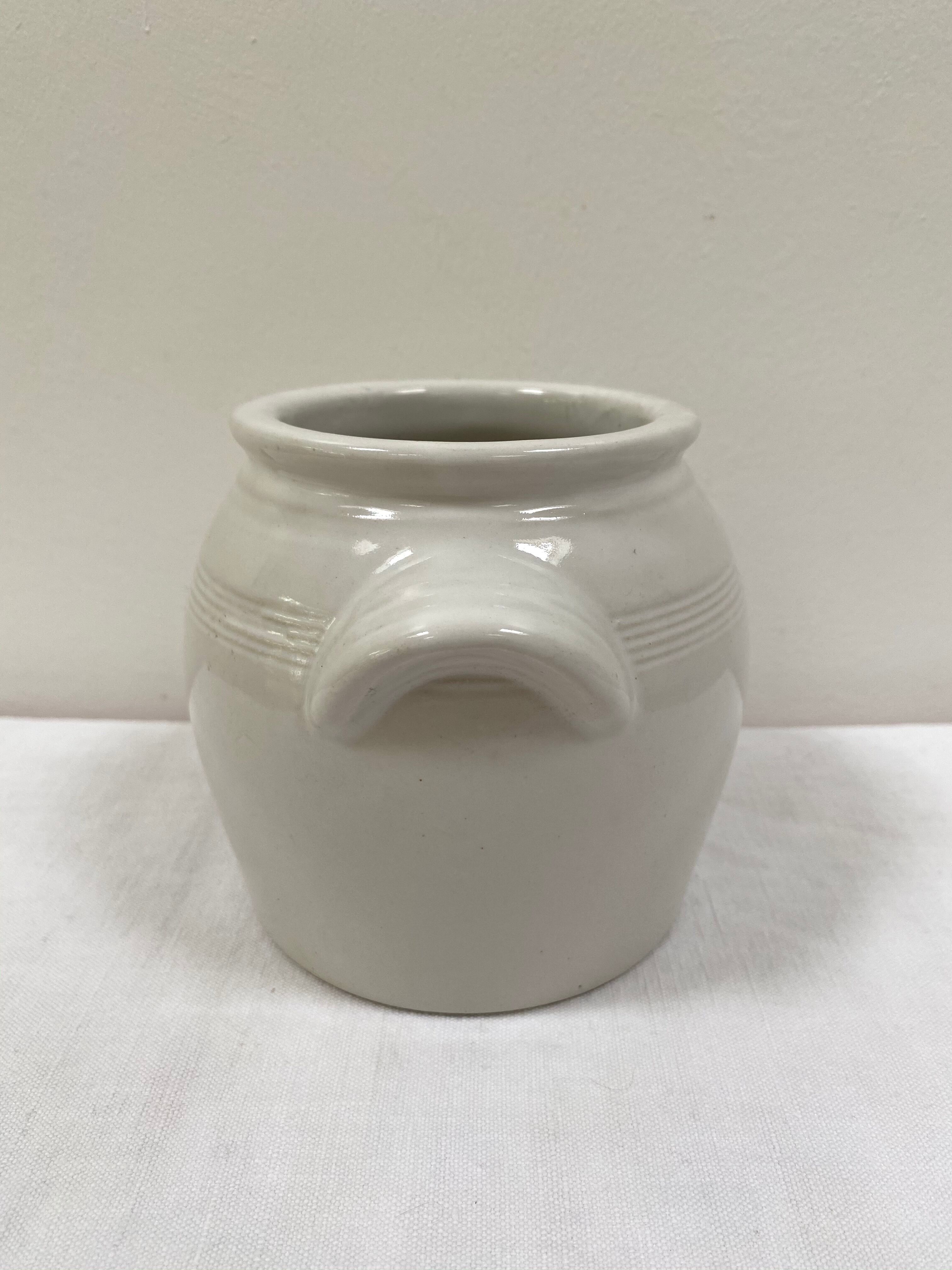 White pot in glazed stoneware