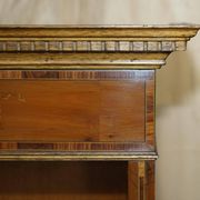 Pair of Sheraton Revival bookcases in satinwood, walnut, and yew.