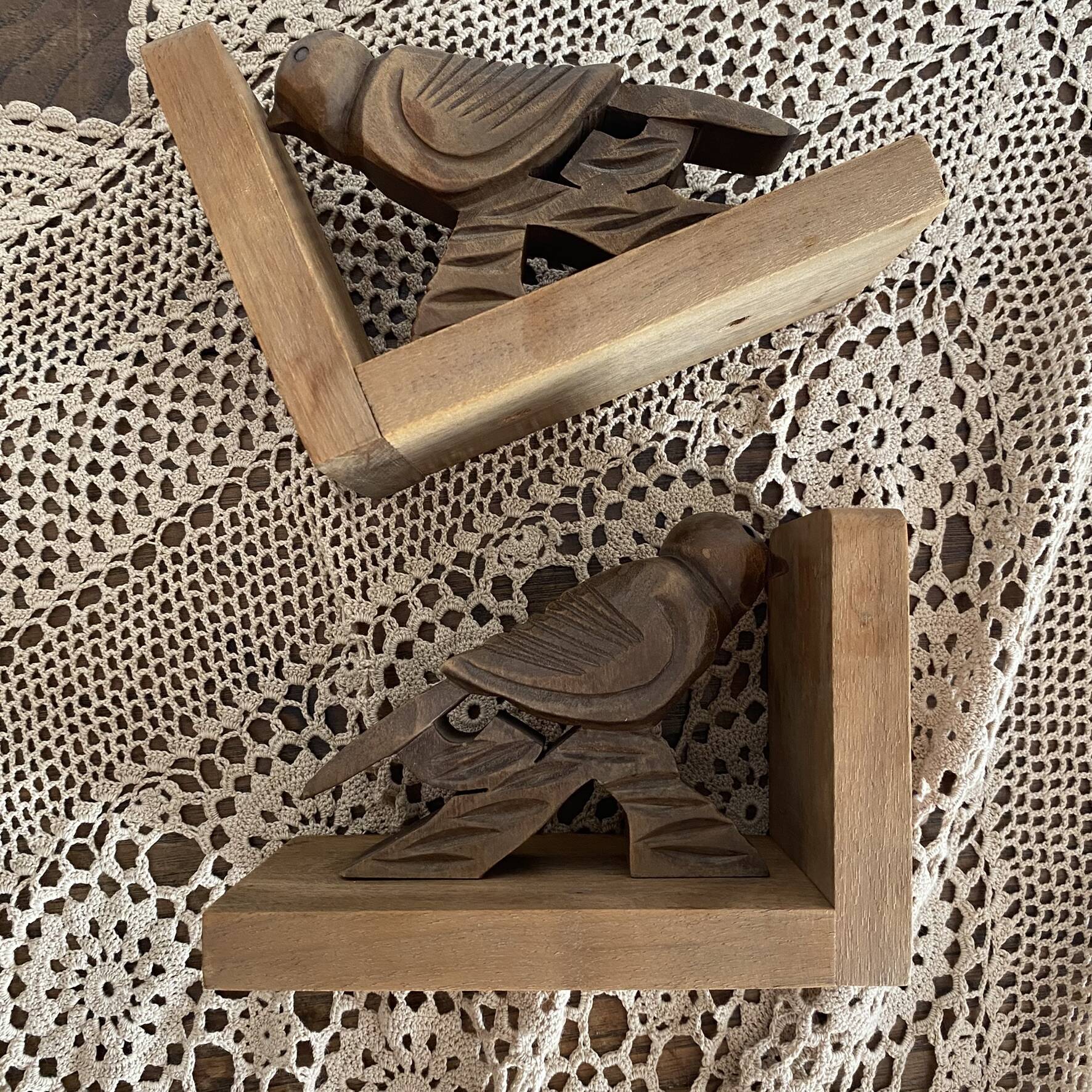 Pair of Art Deco wooden bookends carved with birds.