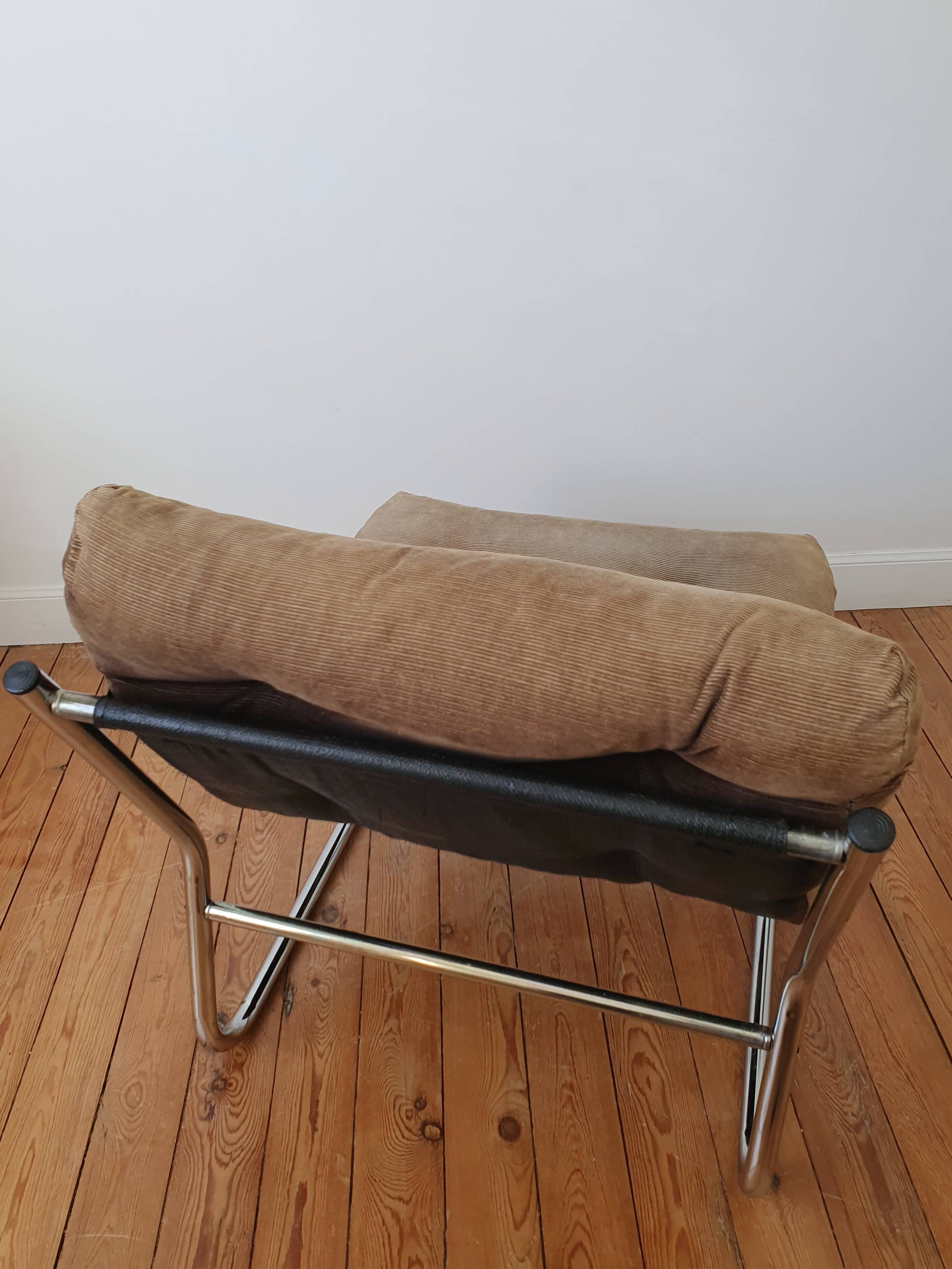 Vintage tubular chrome and velvet armchair