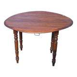 Round table in pine , with flaps