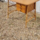 Rattan desk by Louis Sognot