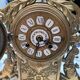 Fireplace trim clock and adornment of antique bronze candelabra