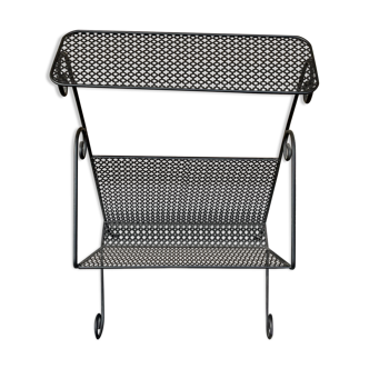 Black perforated metal magazine rack