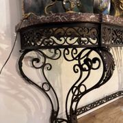 Console in wrought iron from the Napoleonic III period with a red Rance marble top.