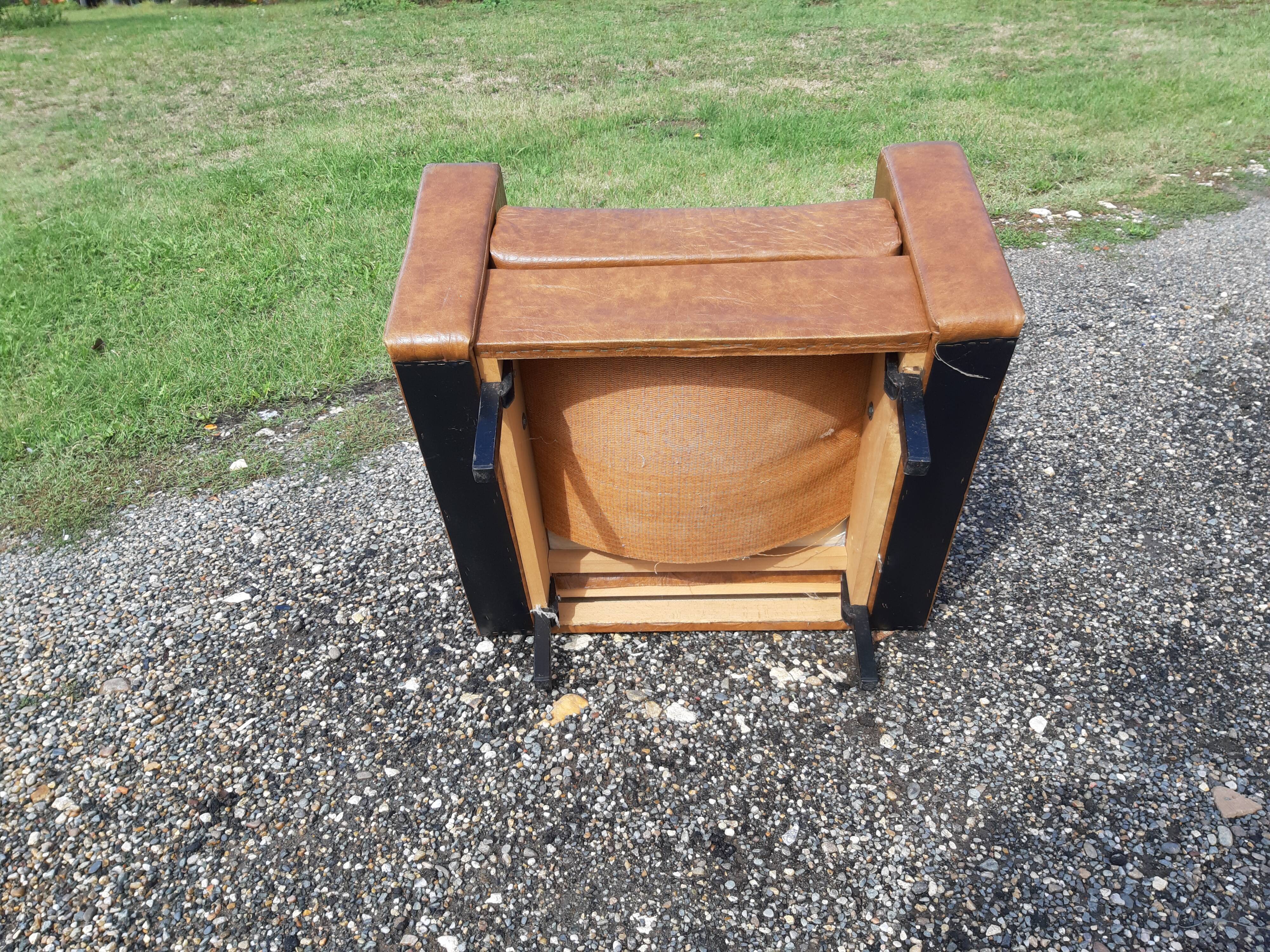 Fauteuil années 60 skai marron