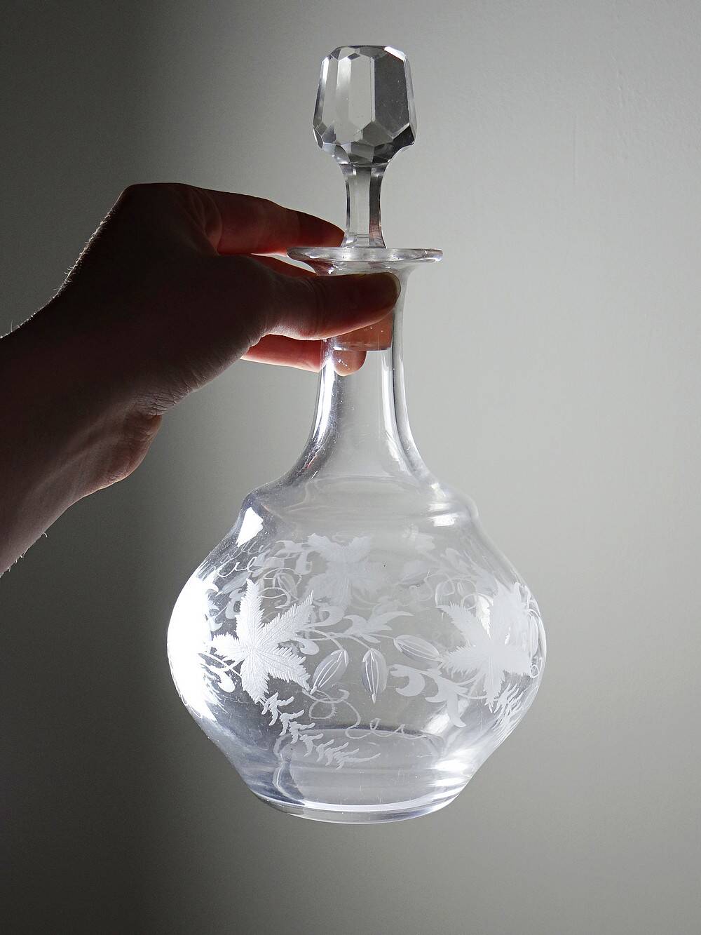 Antique engraved crystal carafe, floral decoration, Bohemia 19th-20th century.