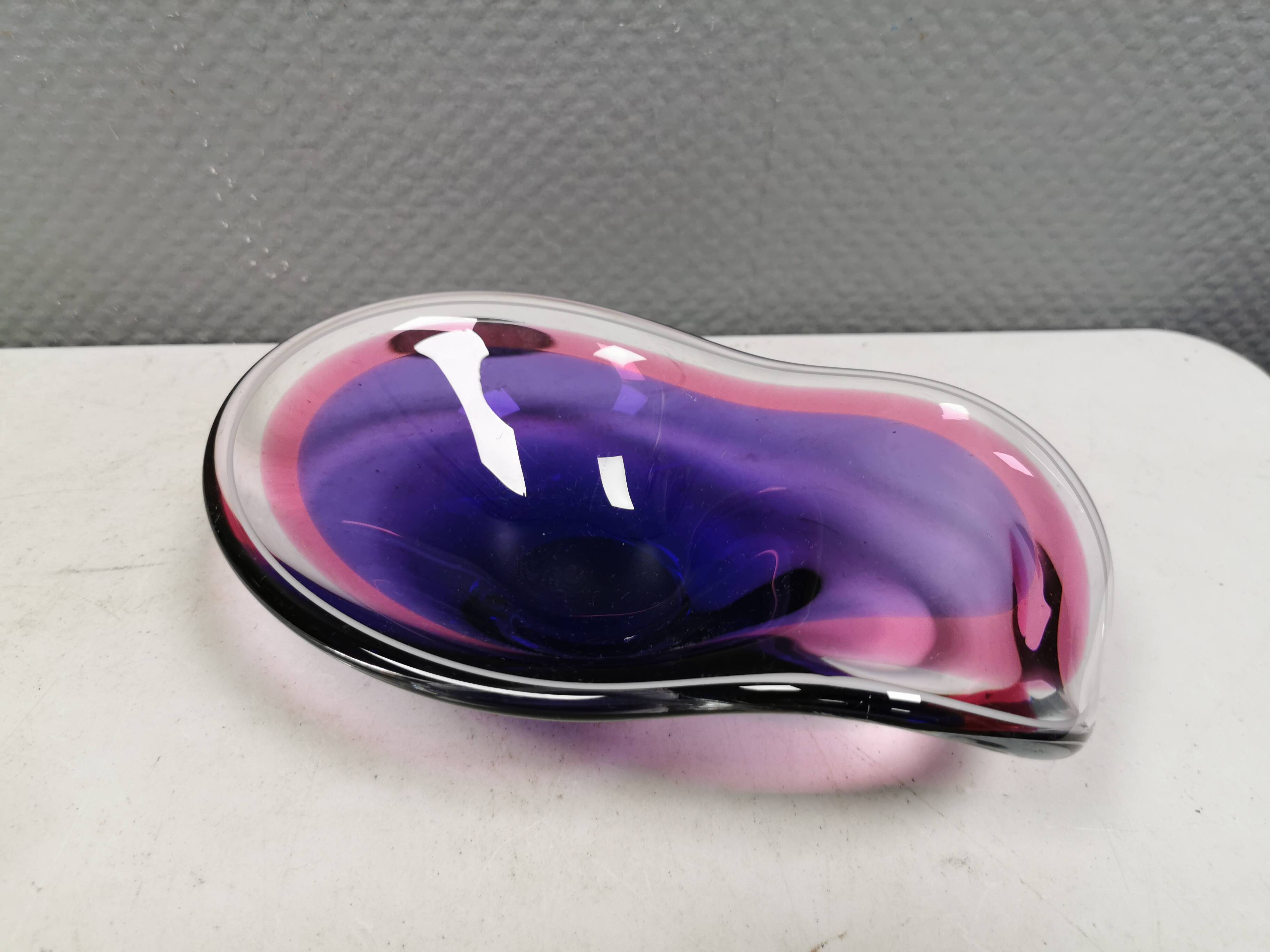Beautiful dish/bowl in many coloured glass.