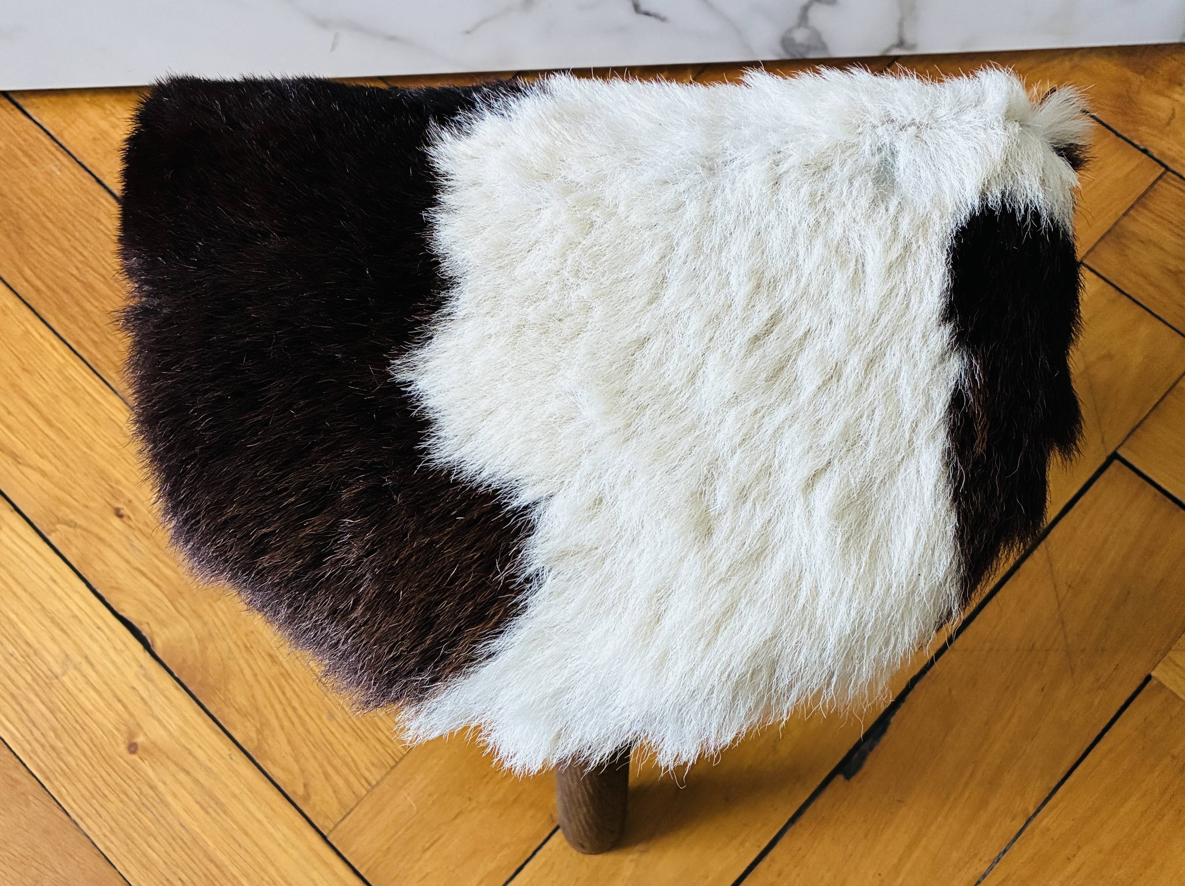 Small tripod stool in cowhide