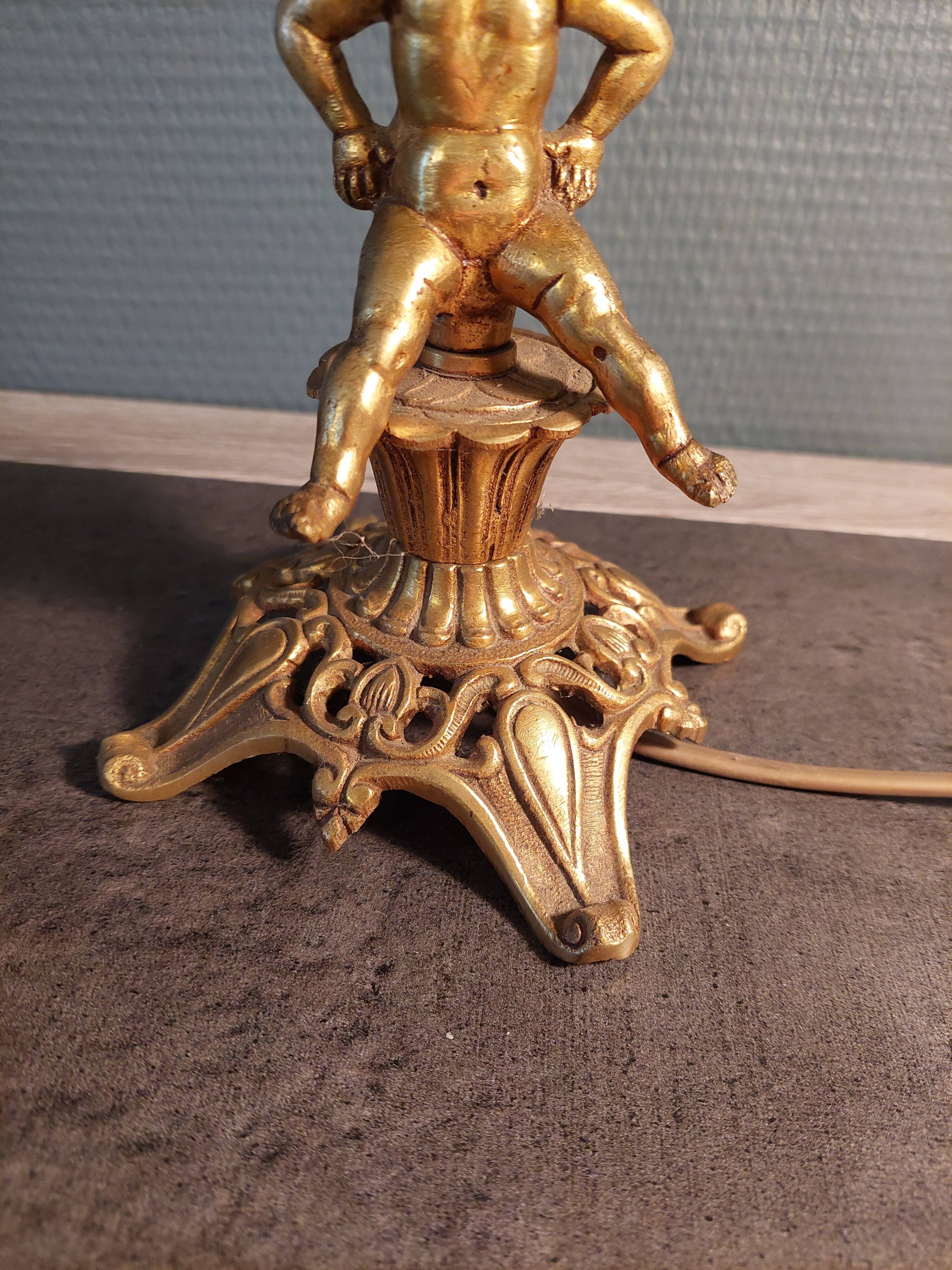 Electrified three-spoke brass candlesticks