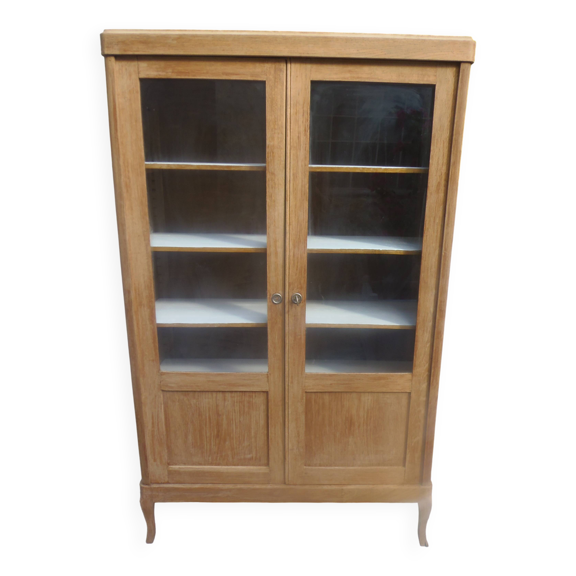 Charming vintage display cabinet from the 1950s in natural wood.
