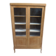 Charming vintage display cabinet from the 1950s in natural wood.