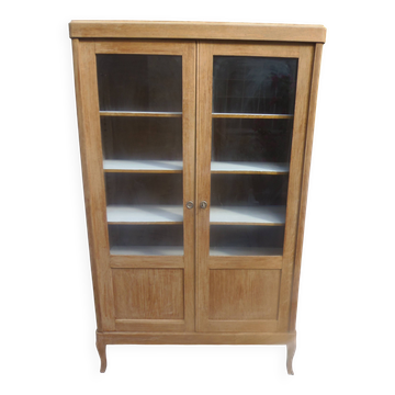 Charming vintage display cabinet from the 1950s in natural wood.