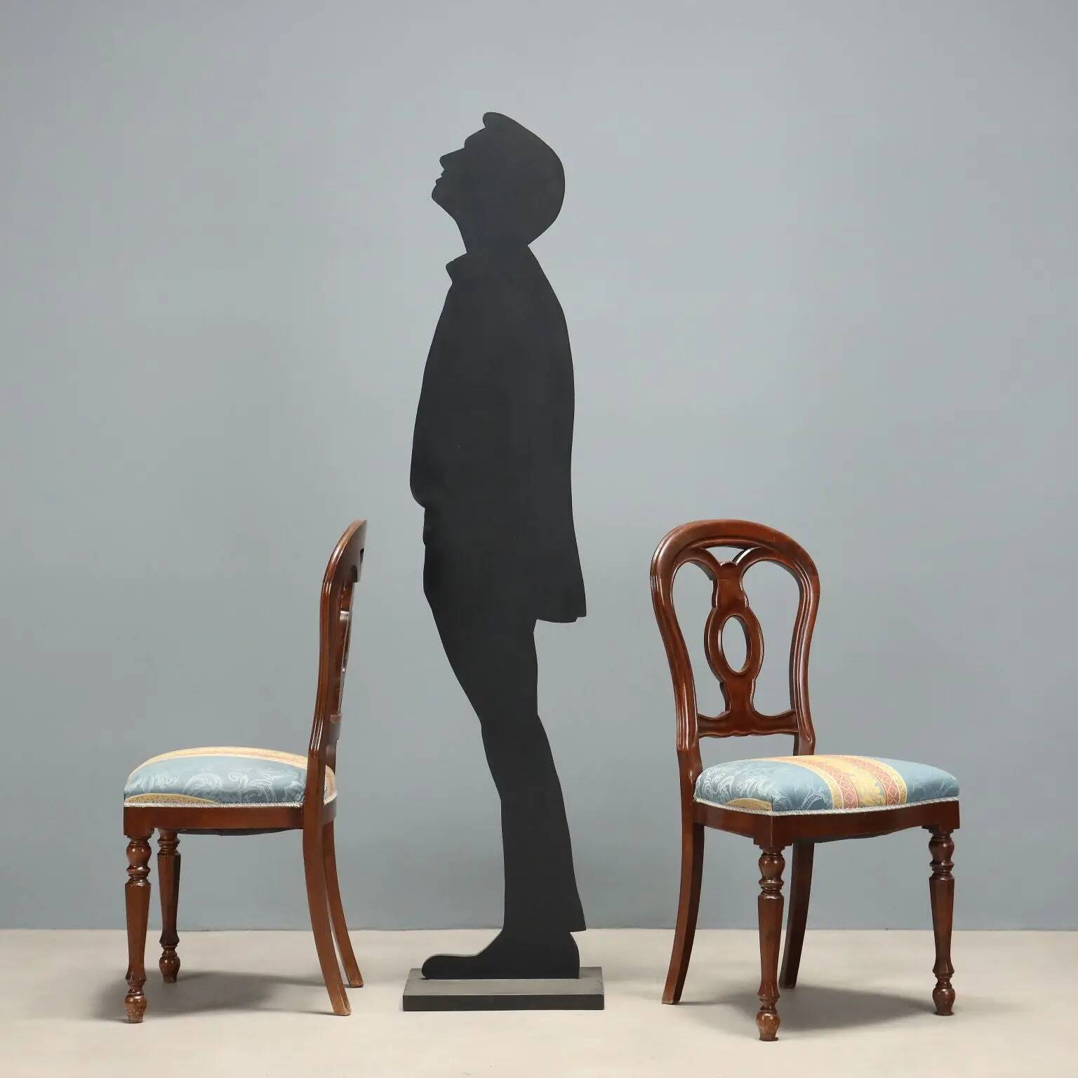 Antique walnut chairs with curved legs, Italy, mid-19th century.