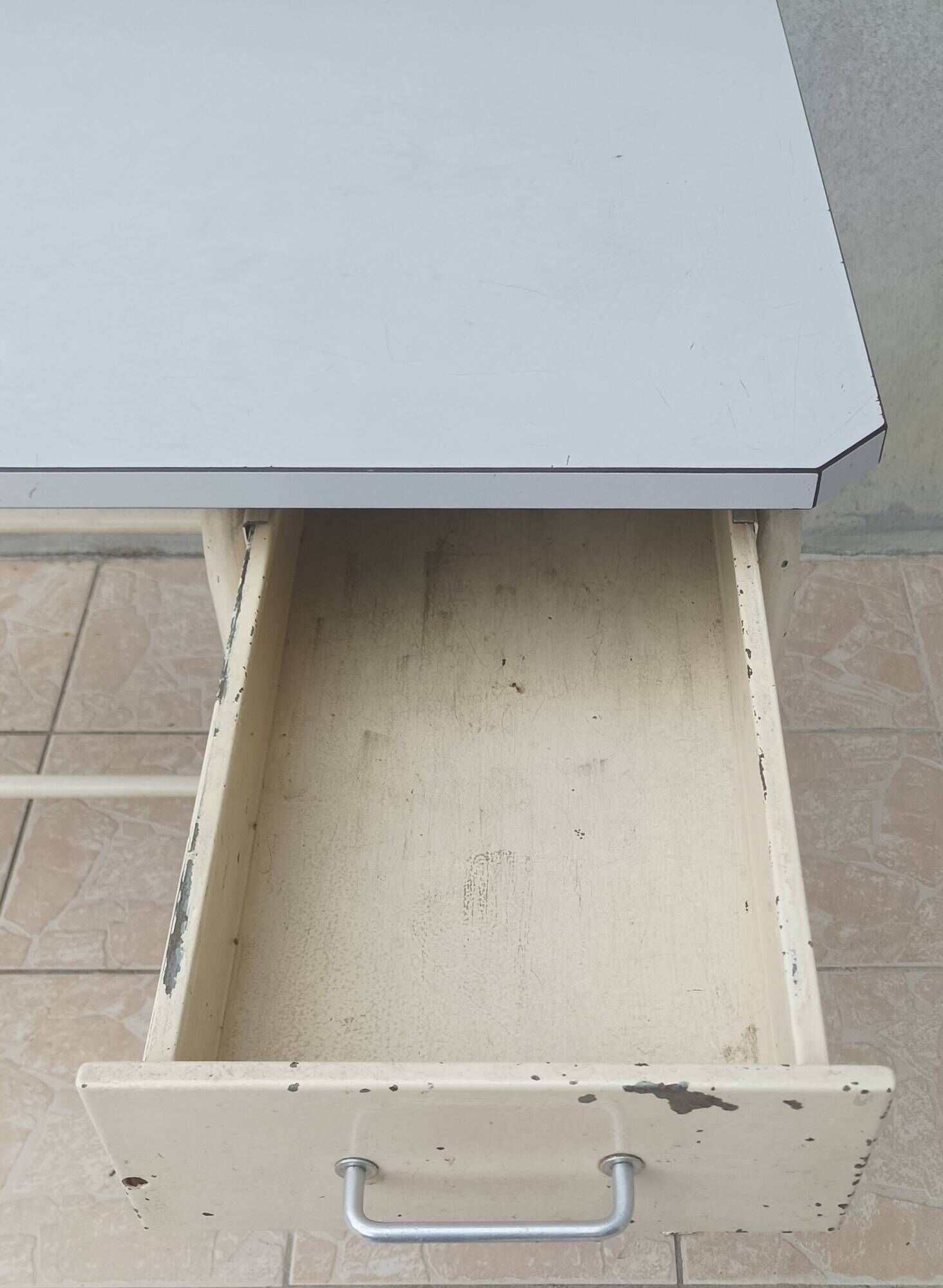 Industrial high table made of metal and formica.