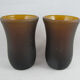 pair of small brown glass cups
