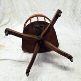 Adjustable swivel American armchair 1900