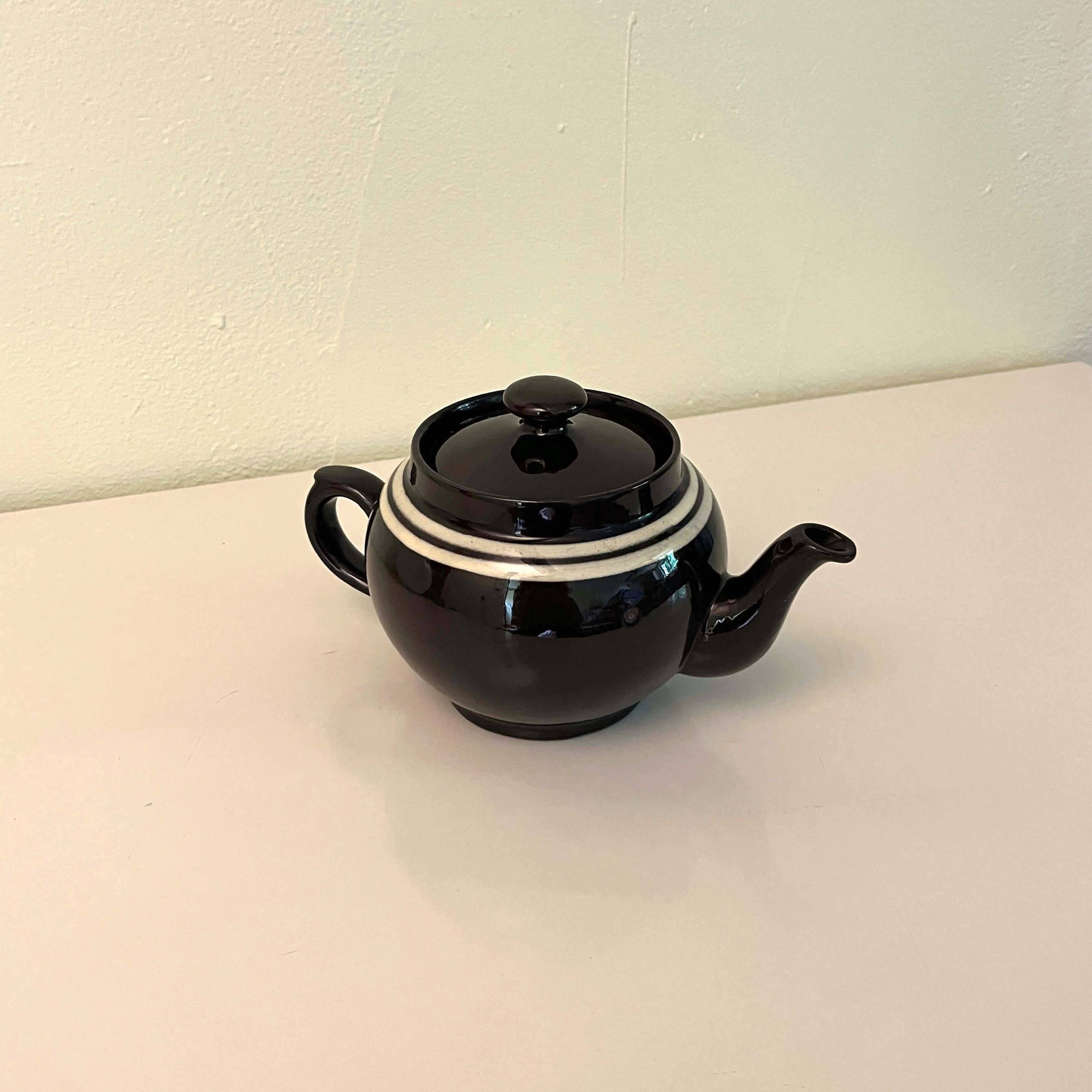 Brown ceramic teapot