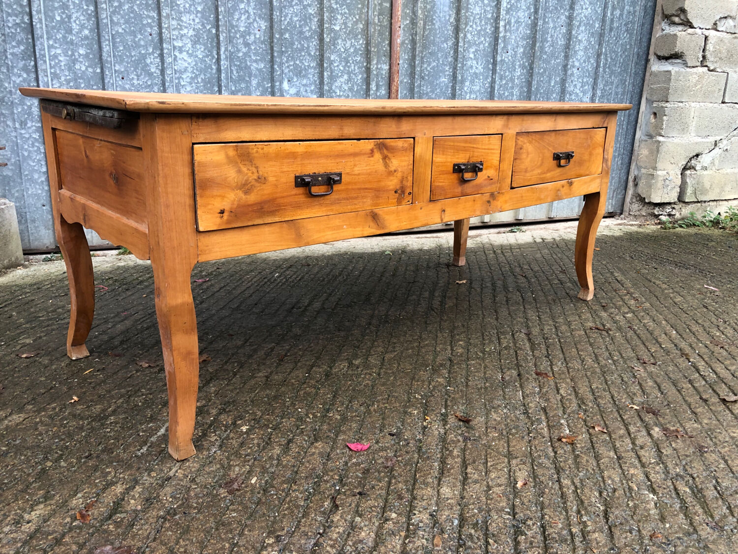 Antique Louis XV table with 3 drawers and 1 pull-out in solid cherry wood